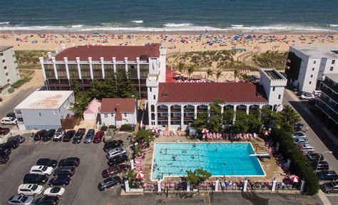 Castle in the sand hotel - Oceanfront hotel complex with Ocean City's largest pool and a popular beachfront bar. Castle in the Sand offers many amenities that distinguish it from other Ocean City hotels -- principally, its Olympic-size pool, which is the largest in Ocean City and has life guards on duty (in season) as well as a diving board (a rarity for the area).